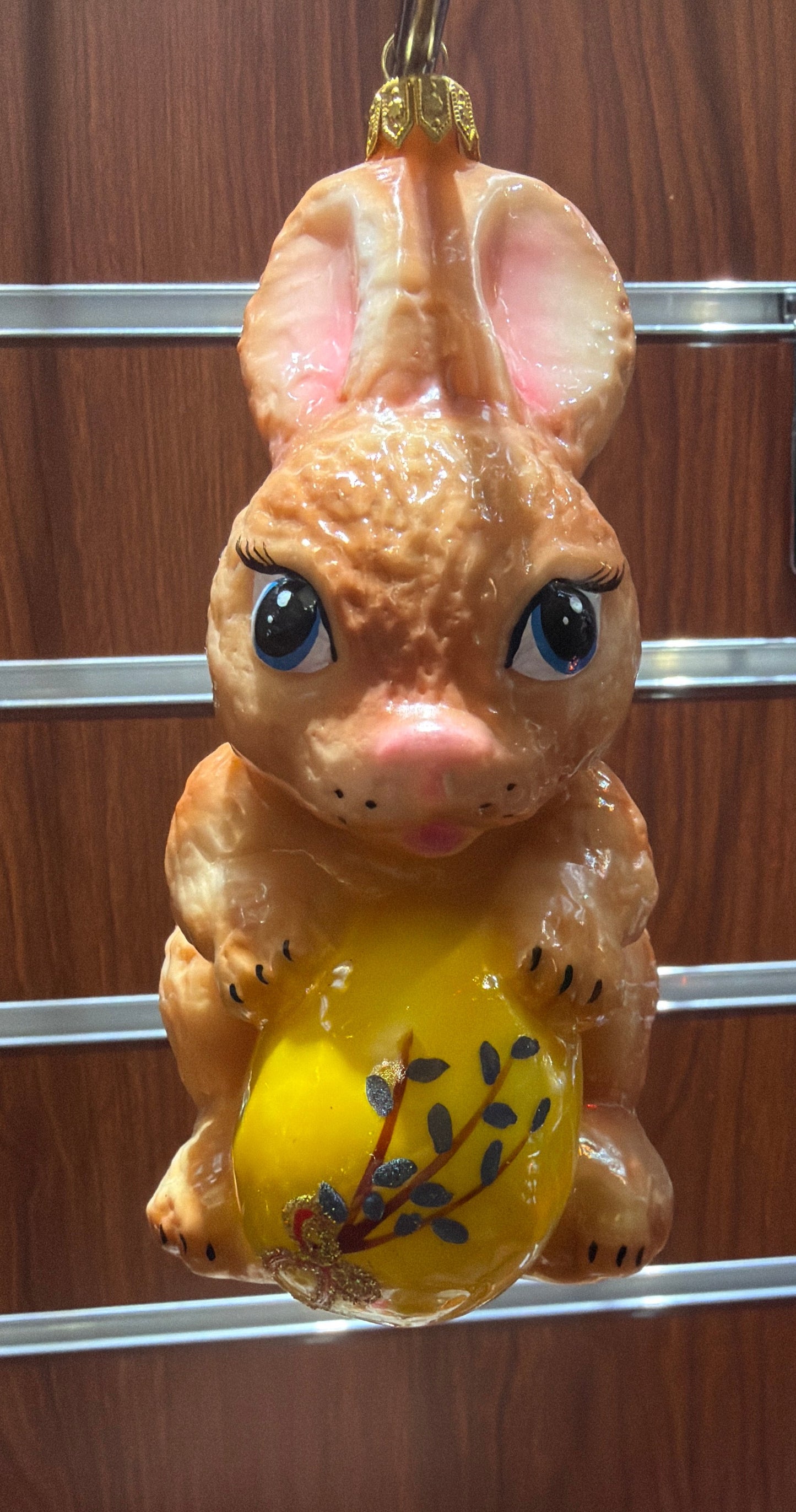 Easter rabbit with yellow egg