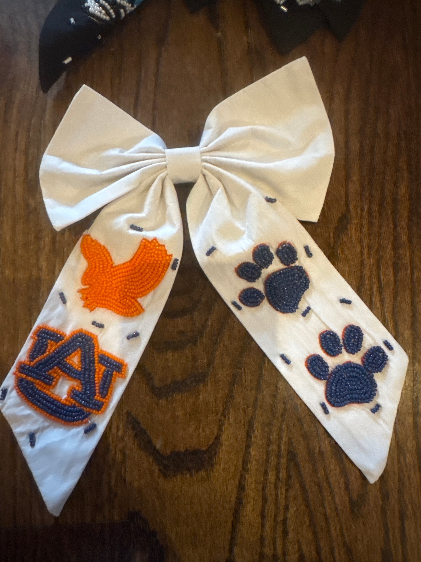 White Auburn logo now