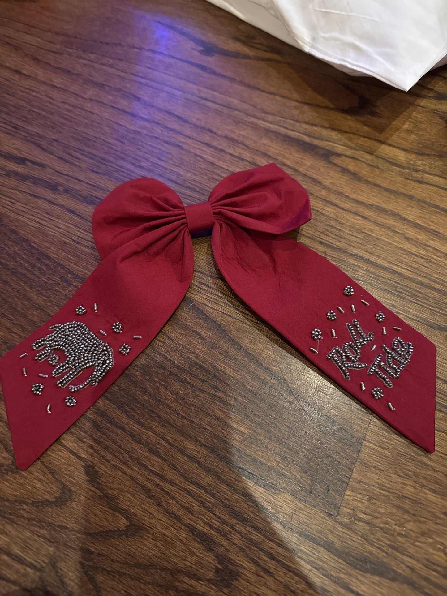 Red Roll Tide with grey writing