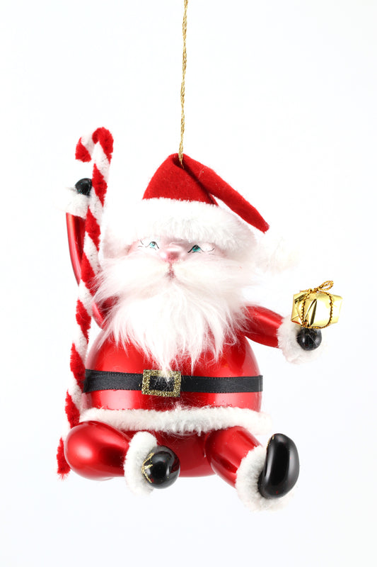 SITTING SANTA CLAUS WITH CANDY